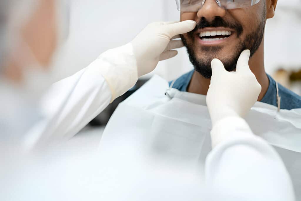Man mid cosmetic dentistry treatment at Kogarah Dental Clinic